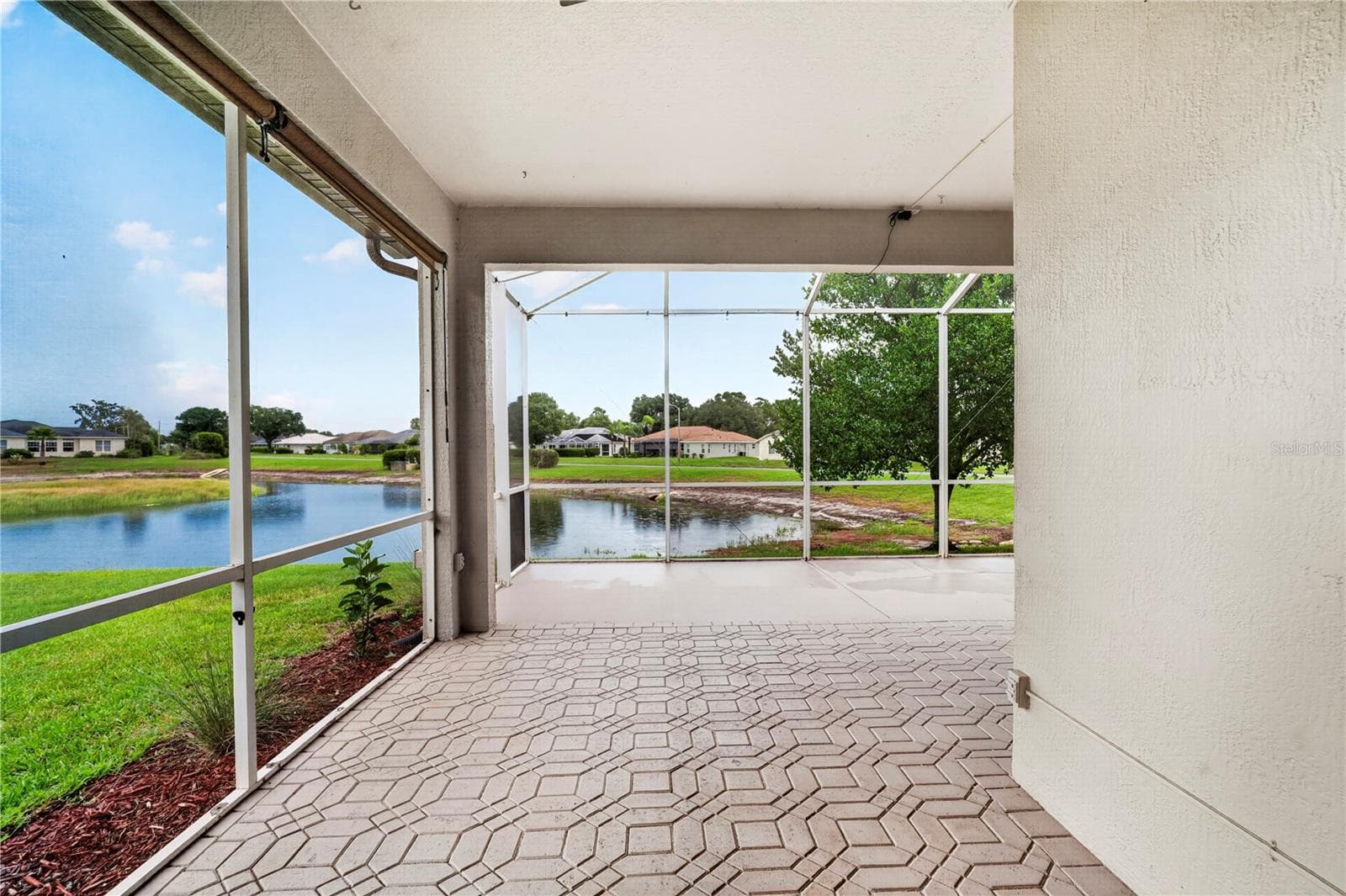 Enclosed screened patio/Lani Water view - 9257 BONNIE COVE DR, WEEKI WACHEE