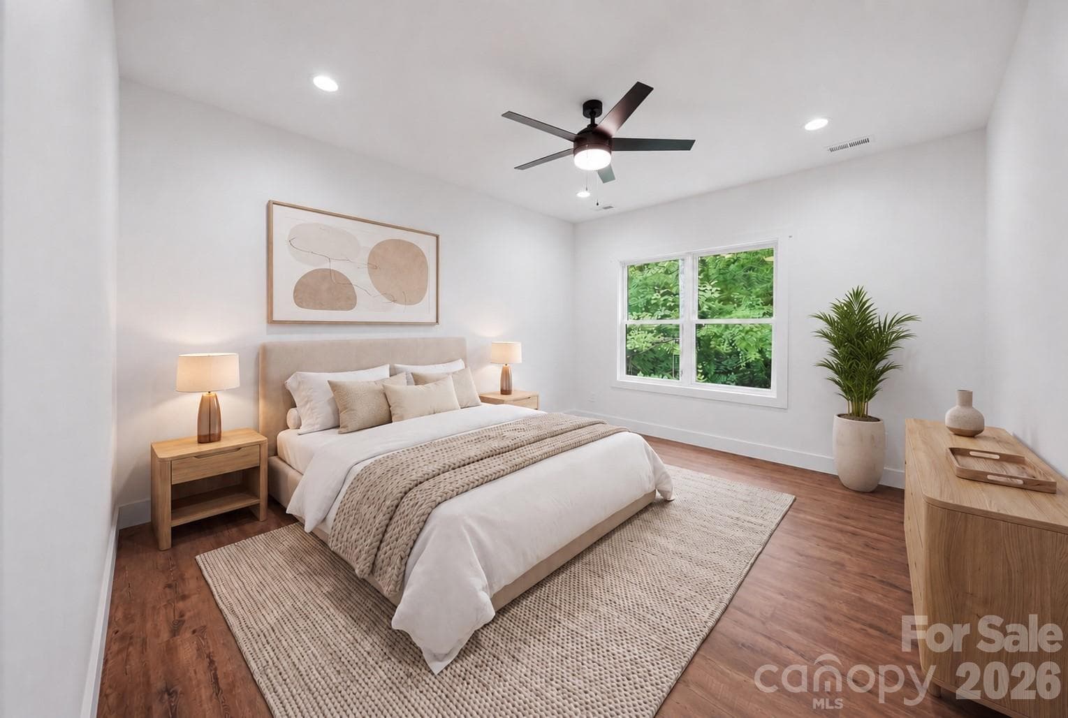 Spacious Primary Bedroom is virtually stages to show furniture placement. - 414 Scarlett Oak Court NE, Lenoir