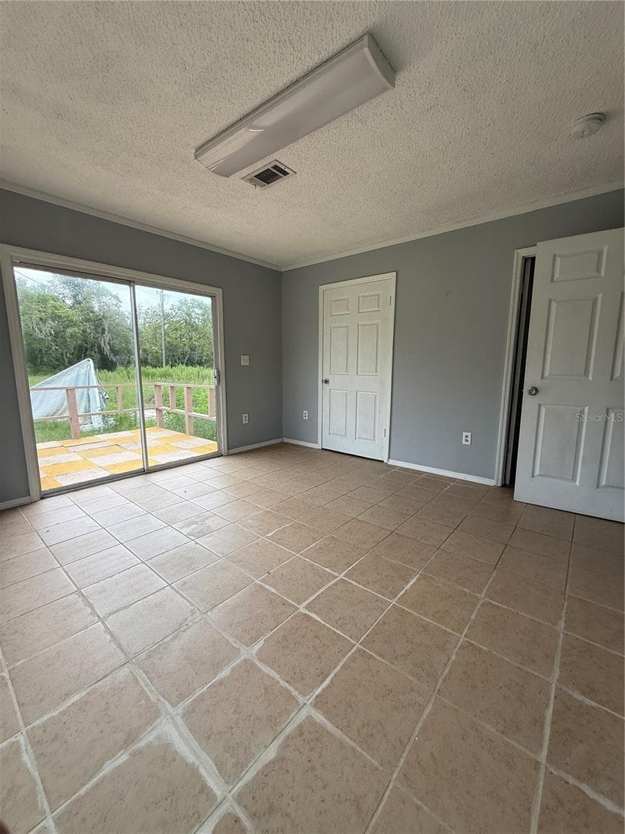 Primary bedroom with bathroom and walk in closet - 16036 BOSLEY DR, SPRING HILL