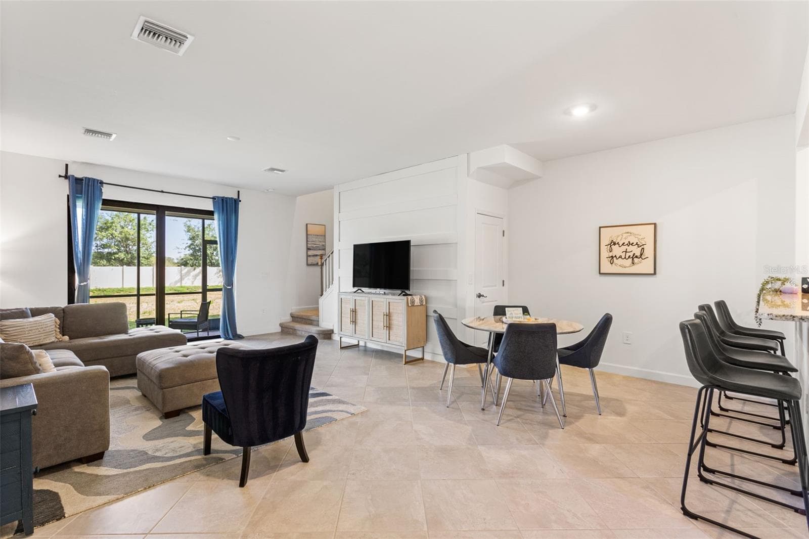 With 1,942 square feet of bright and inviting living space, this residence seamlessly blends functionality with style - 14275 PINE LODGE LN, FORT MYERS
