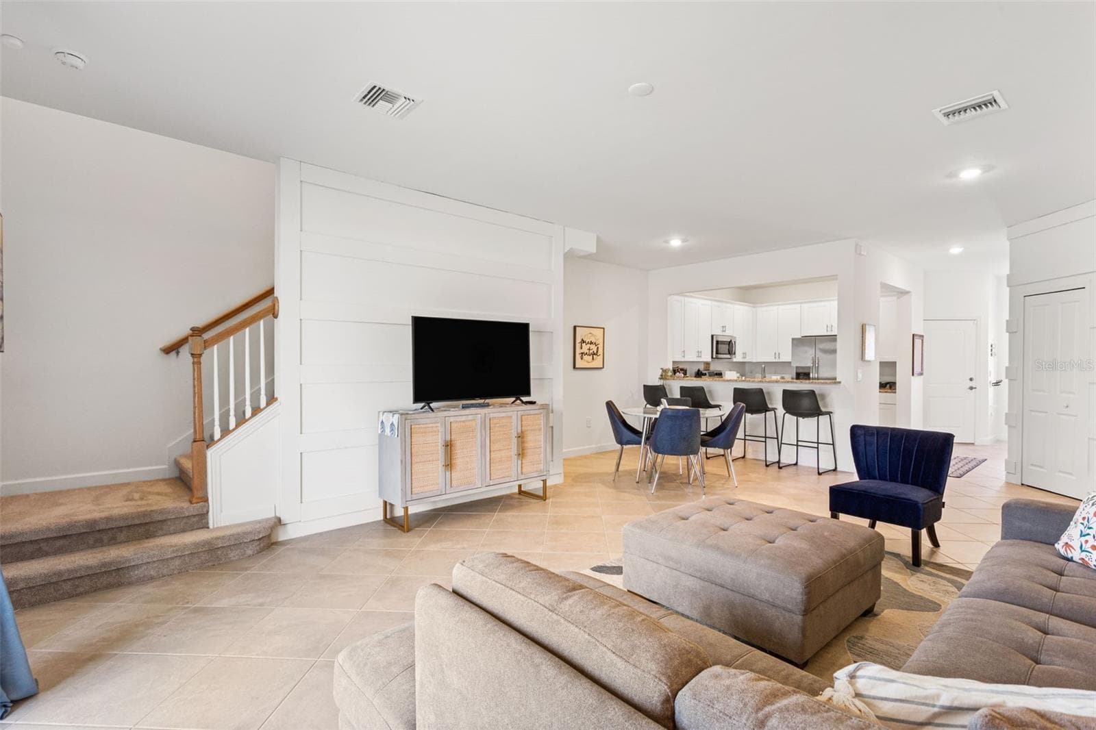 A cozy nook under the stairs makes the ideal space for a small office, extra storage or even, a reading hiding nook - 14275 PINE LODGE LN, FORT MYERS