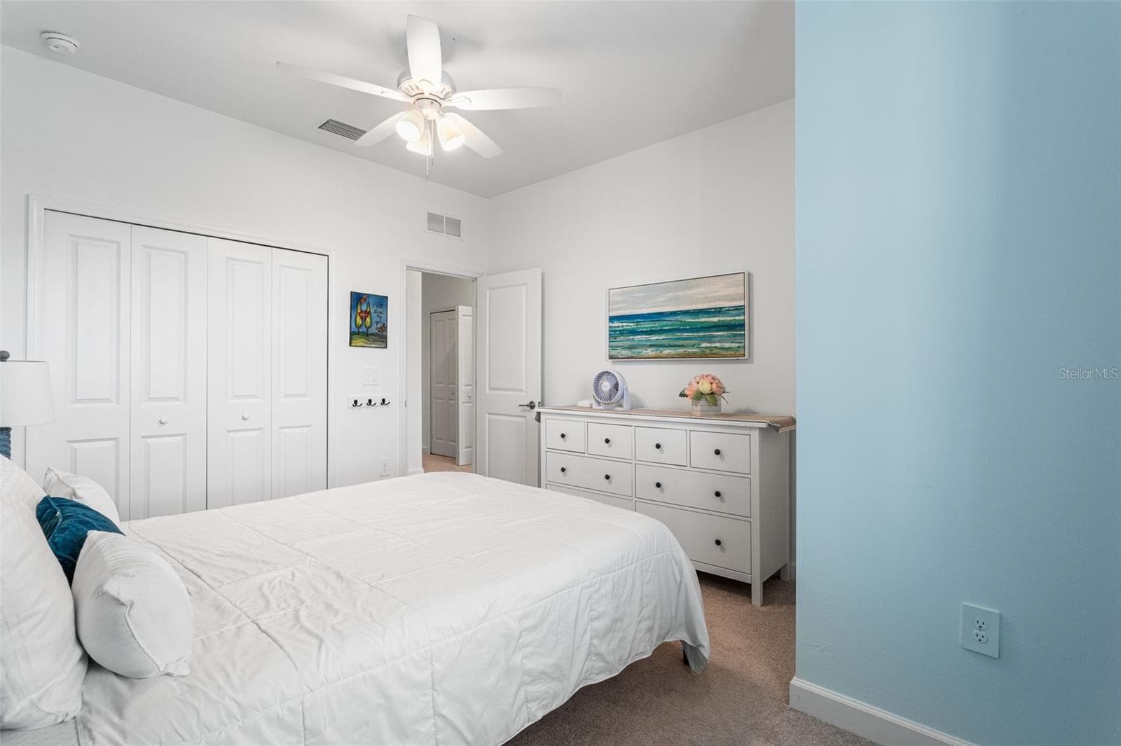 Comfortable third bedroom offering ample space, abundant natural light, and a large closet for added storage - 14275 PINE LODGE LN, FORT MYERS