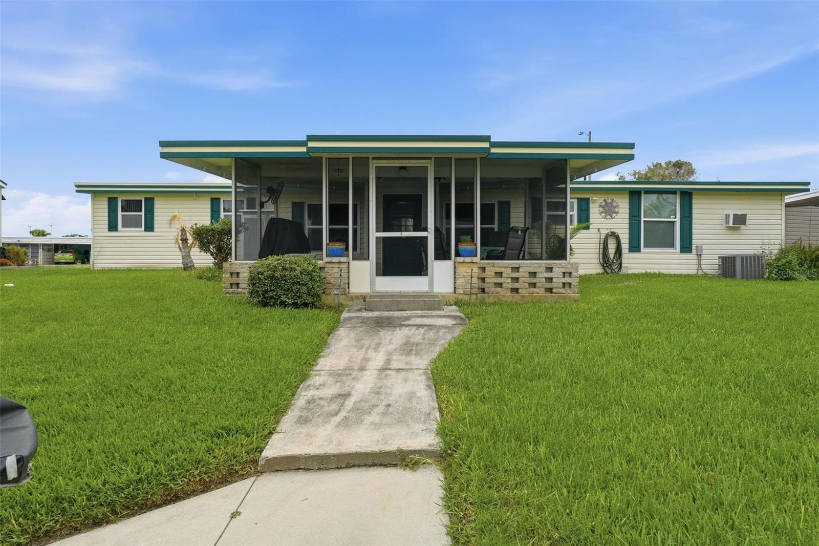 exit rear patio to canal - 928 MORNINGVIEW DR, TAVARES