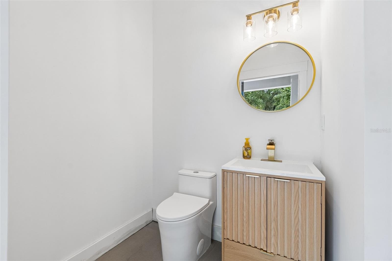 Half bath on 1st floor - 12000 GOLDEN VALLEY DR, NEW PORT RICHEY