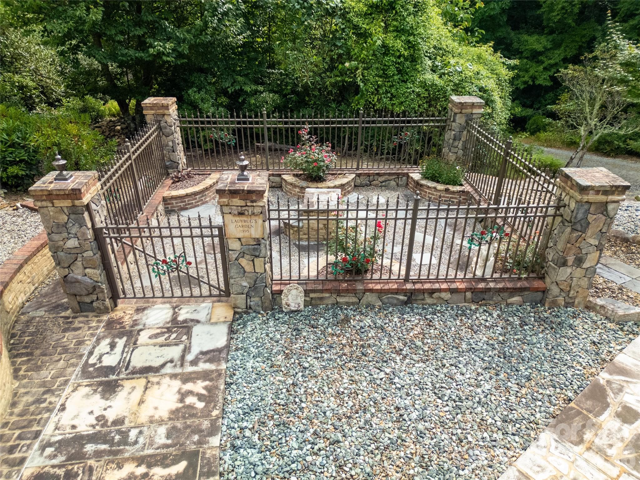 Lady Bug Garden with its iron fences, stone columns and pathways! This place is special.! Sit and read, enjoy the solitude and the natural surroundings! So many possibilities for what can be done in this unique little sanctuary! - 275 Hubbard Hollow Road, Rosman
