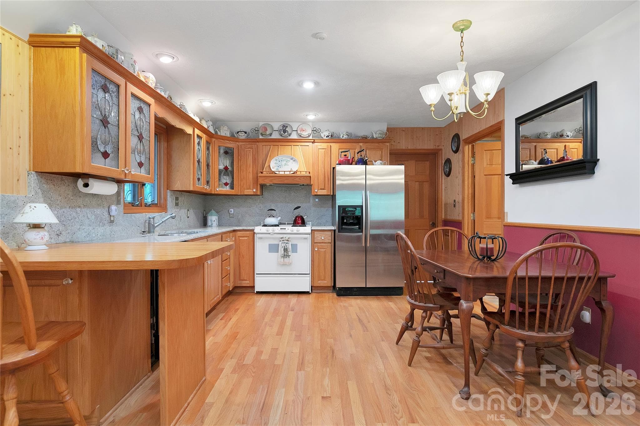 The kitchen and dining area have lots of cabinet space, counter space, breakfast bar, and ample room to move around.! - 275 Hubbard Hollow Road, Rosman