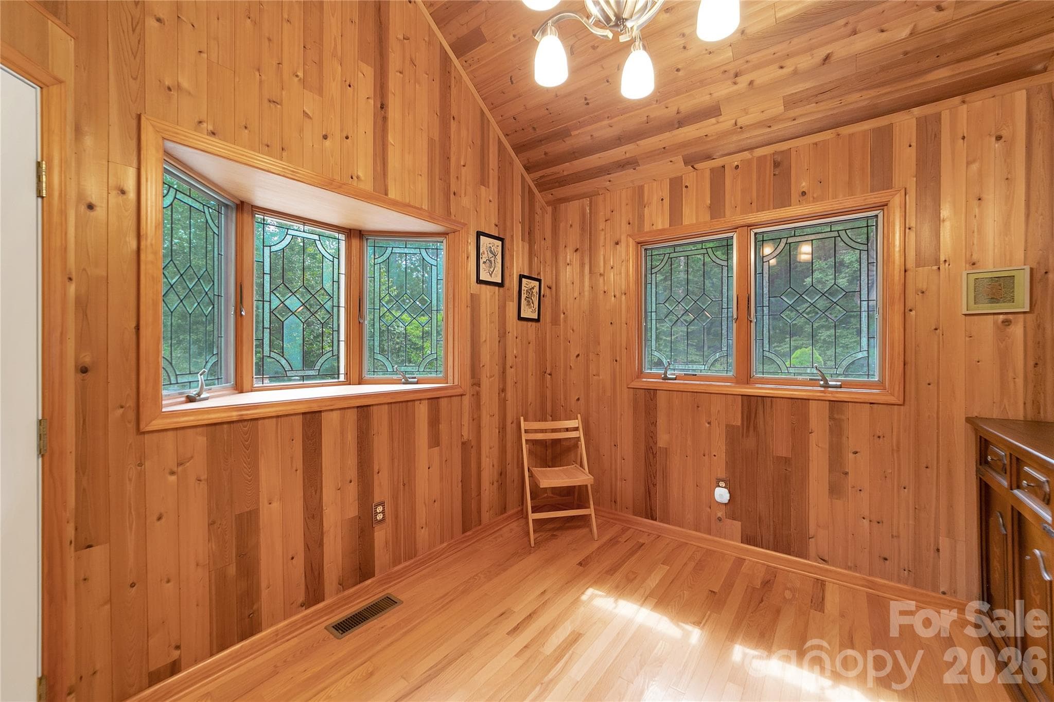This bonus room could be a small bedroom with bunk beds or twin beds. Could be a wonderful reading room or meditation room.! Or an amazing small home office with its own entrance from outside.! - 275 Hubbard Hollow Road, Rosman