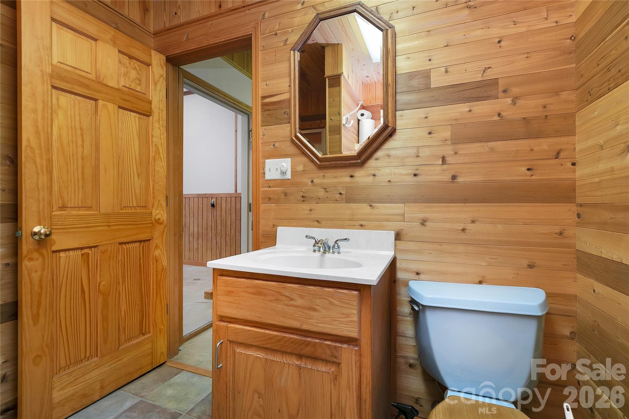 This is the second, full, bathroom beside the mud room and the garage. Come in the back door from the Lady Bugs Custom Fountain Waterfall (unfinished). Shower and head on inside! - 275 Hubbard Hollow Road, Rosman