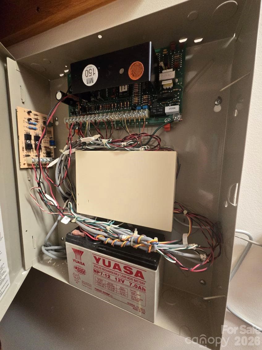The house does have a whole house security system. Installed, but never powered up by the owner. Ready for you to make it purr.! - 275 Hubbard Hollow Road, Rosman