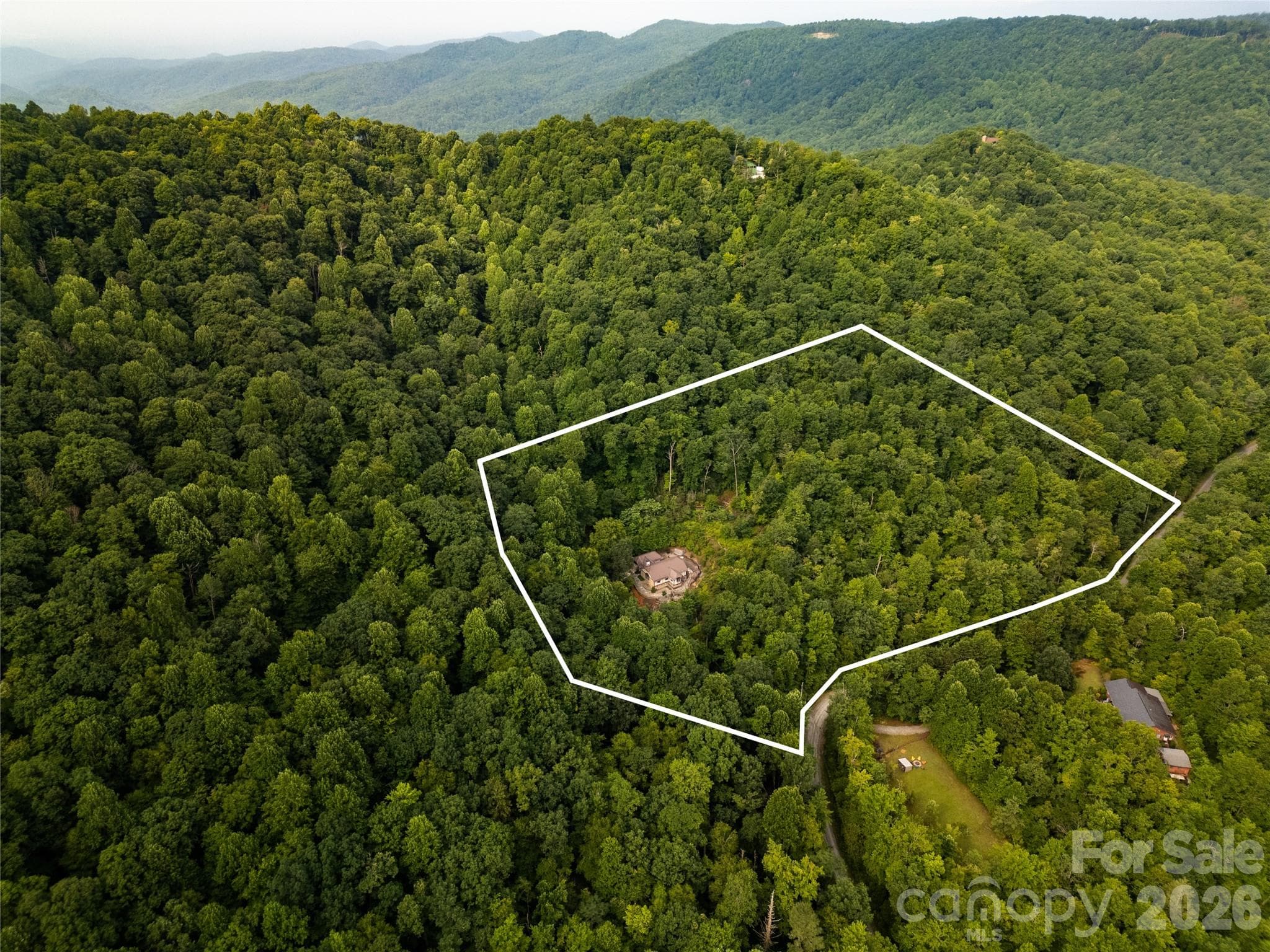 An oasis of privacy on this almost eleven (11) acre parcel. As seen here, "Ain't many neighbors in ear shot".! Plenty of room to build another house on five of these acres if you wish. - 275 Hubbard Hollow Road, Rosman