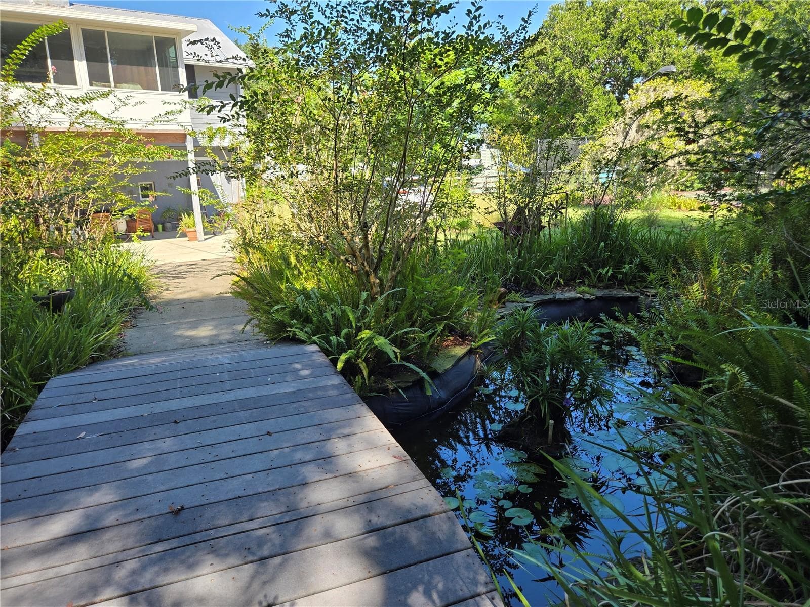 Bridge over pond to Garden - 18249 ROSE ST, GROVELAND