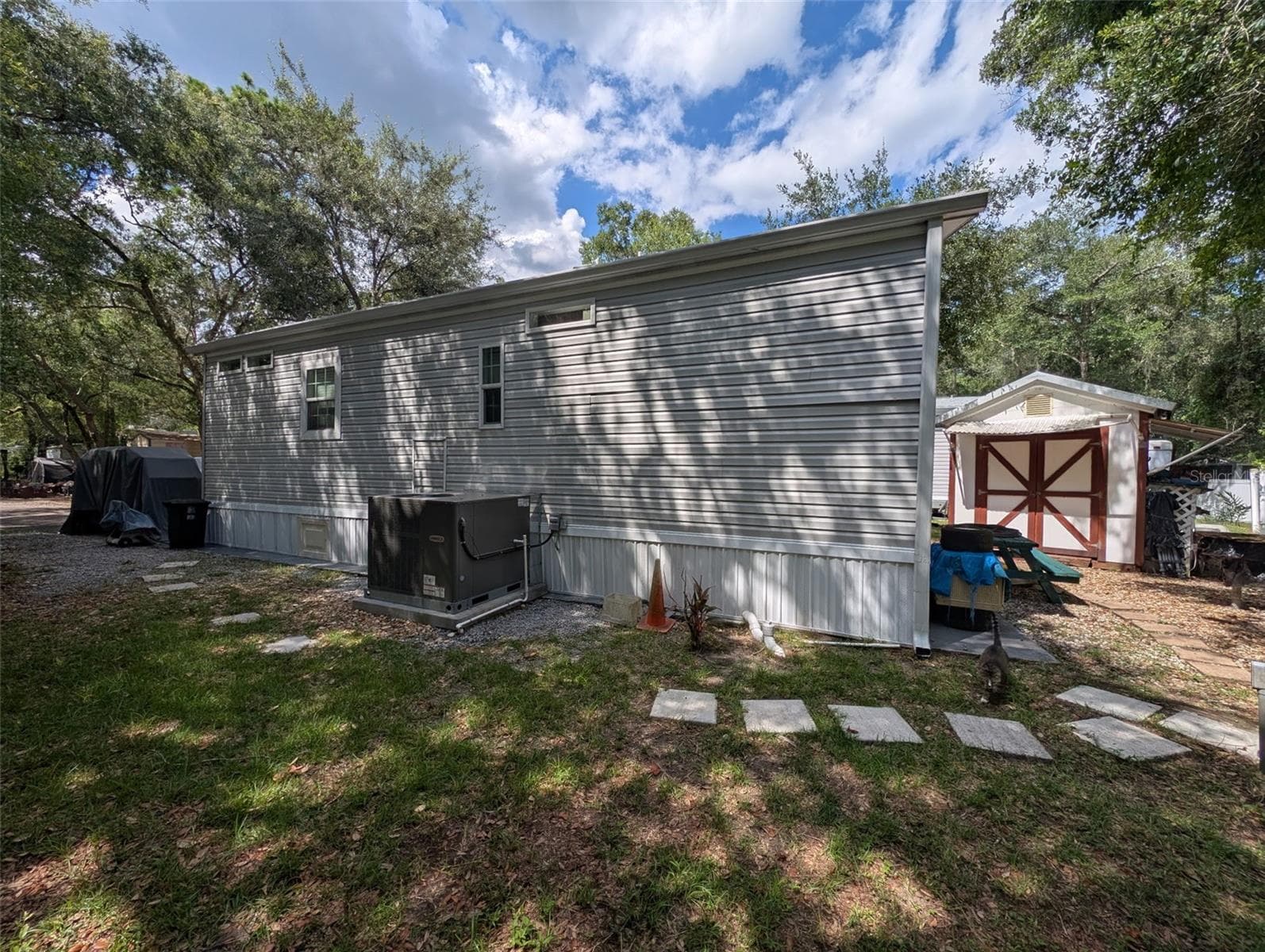 Manufactured Home at 25364 NE 139TH LOOP, FORT MC COY, photo 3 of 9