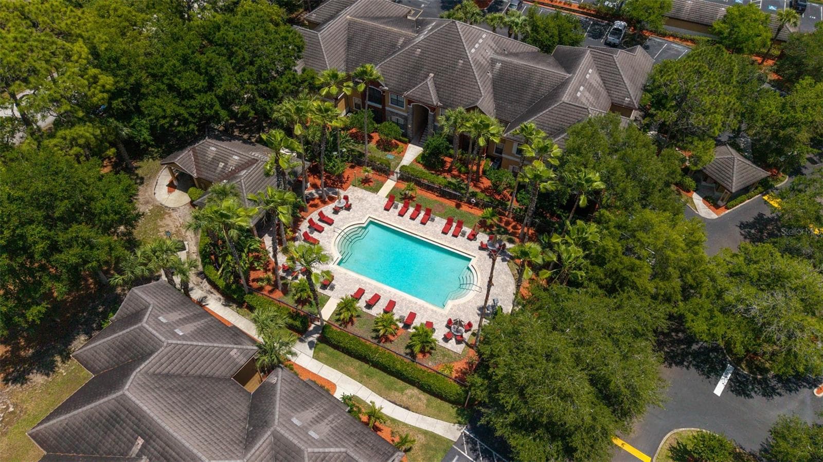 additional outdoor pool located on the same side as the unit - 2176 PORTOFINO PL #6-2612, PALM HARBOR