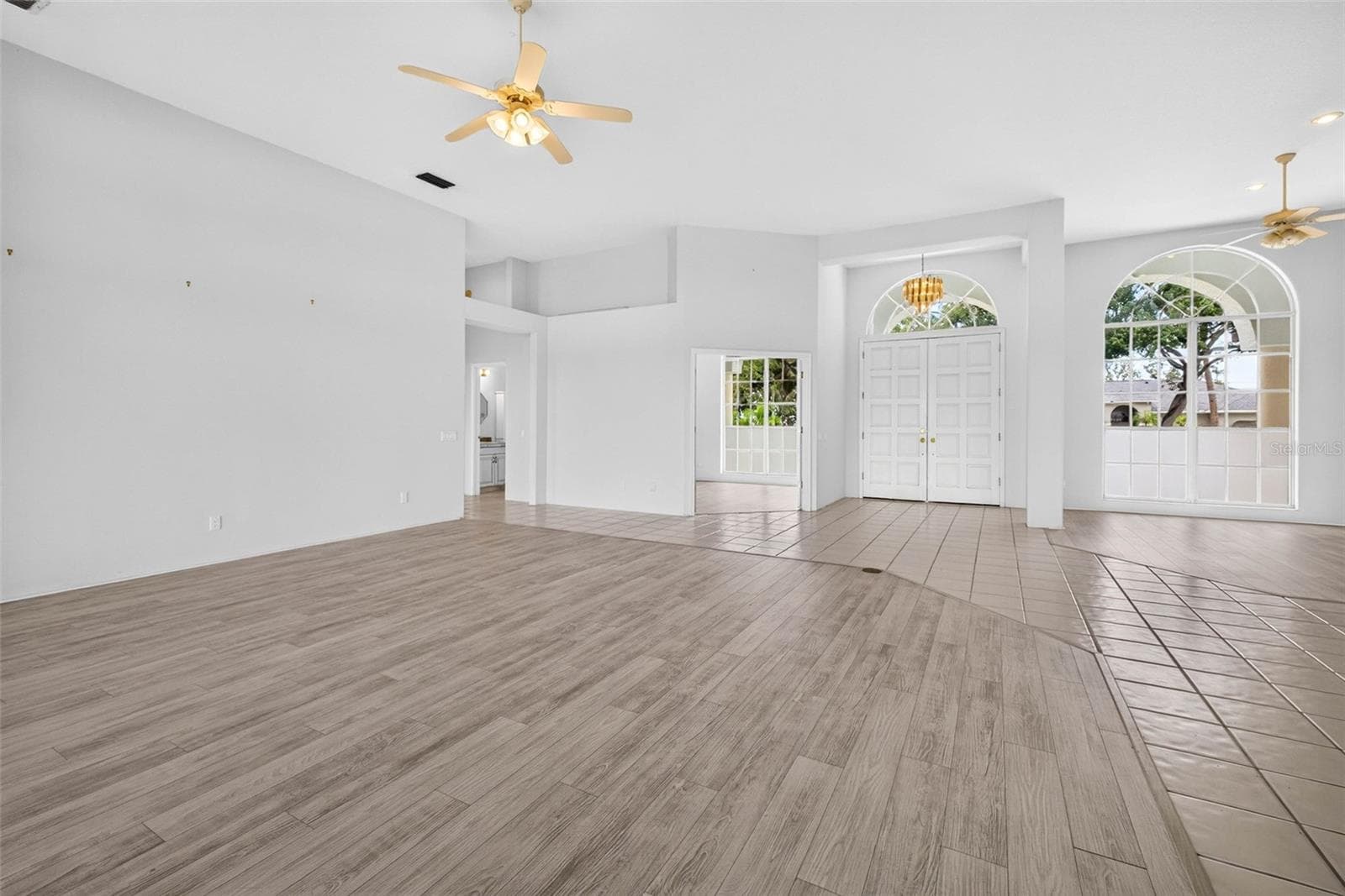 Large Living Room with view of Dining Room, Entryway, Den/4th Bedroom and Half Bath for Guests and 4th Bedroom - 8911 RIVERLACHEN WAY, RIVERVIEW
