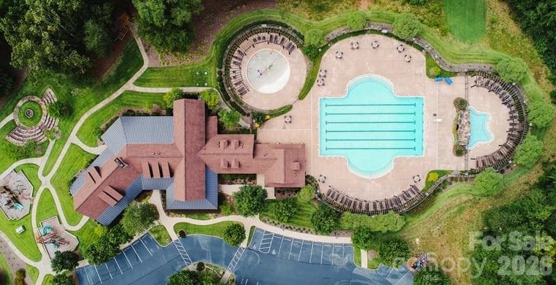 Resort style amenities, featuring Jr Olympic pool complex, 22+ miles of private trails, full fitness center and sports facility - 13702 Sage Thrasher Lane, Charlotte