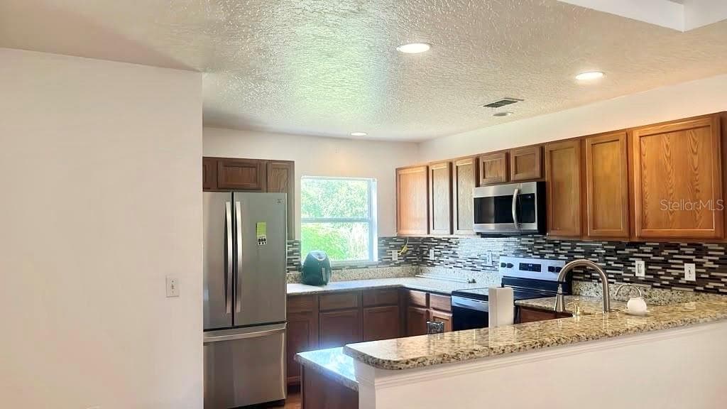 Single Family Residence at 619 MAYAN PL, KISSIMMEE, photo 9 of 26