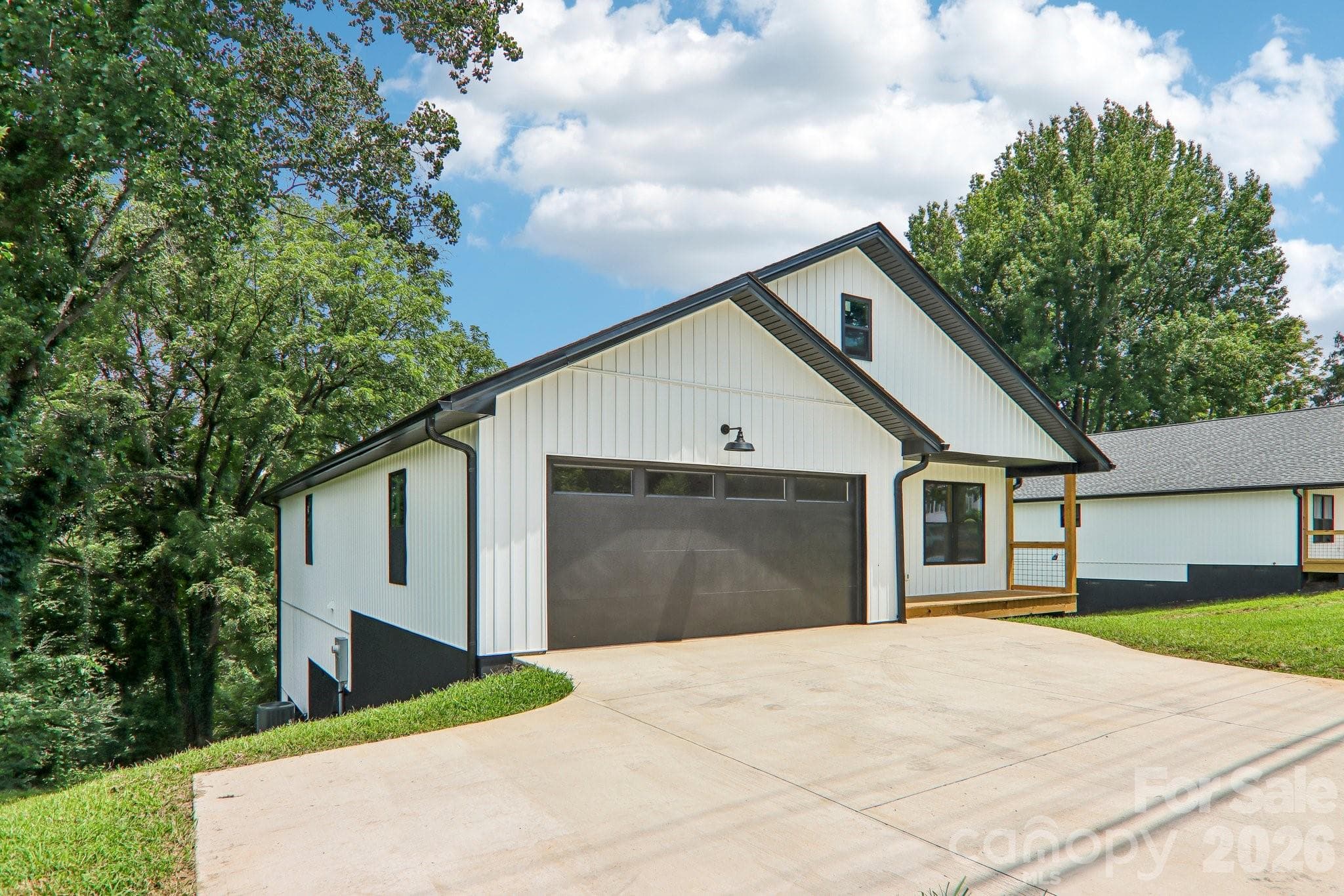 Double garage with extra parking pad. - Mars Hill