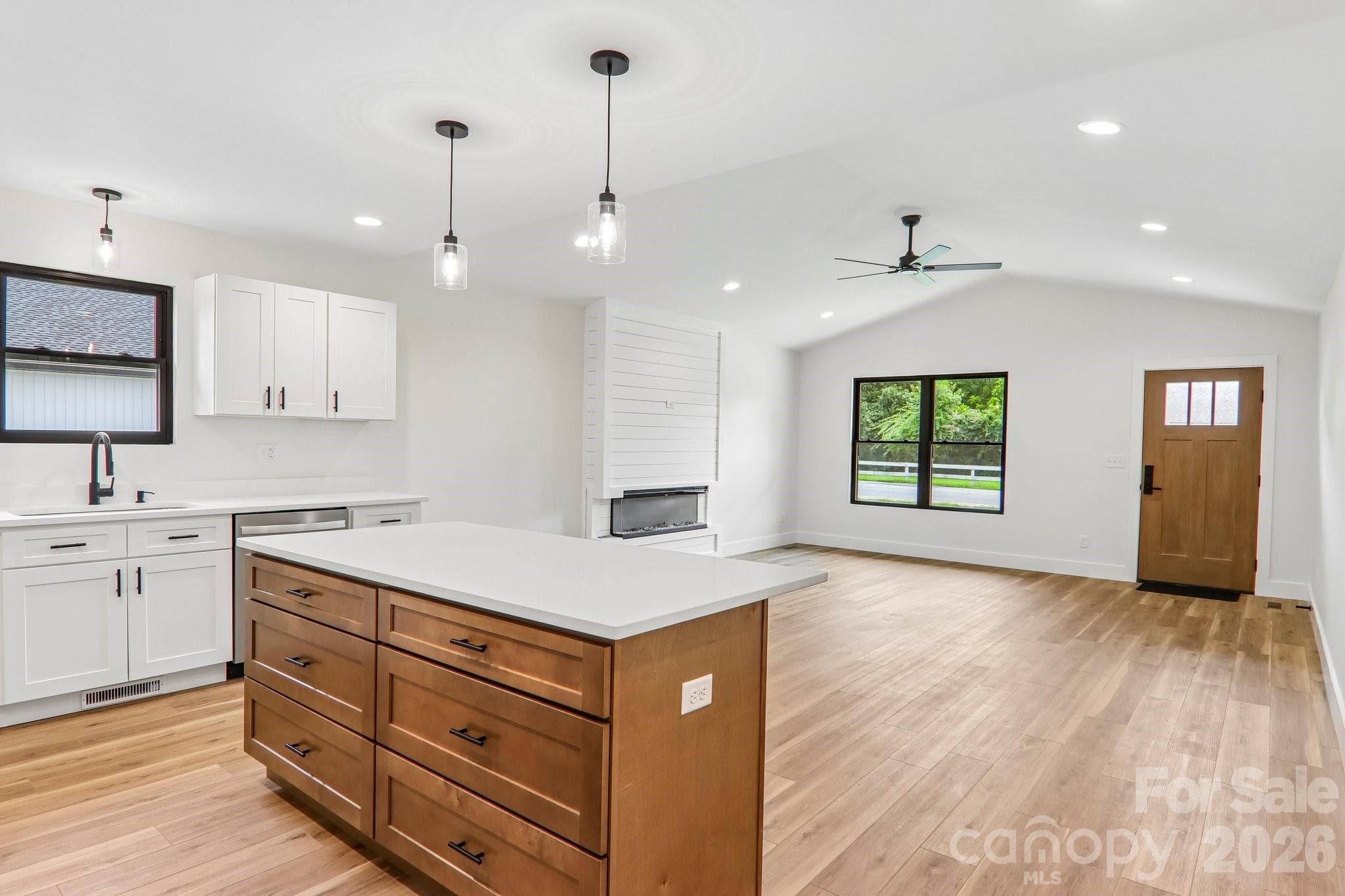 Kitchen island with seating and custom drawer base cabinet with soft close. - Mars Hill