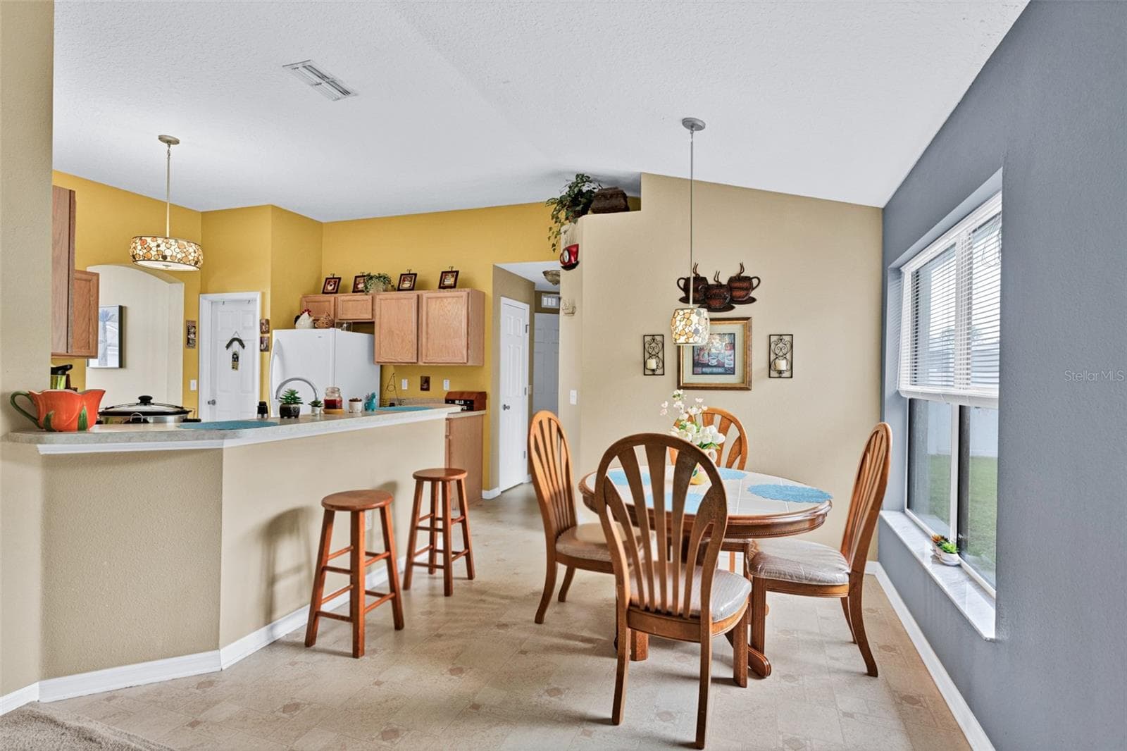 view of breakfast nook and kitchen - 7 PHOENIX LN, PALM COAST