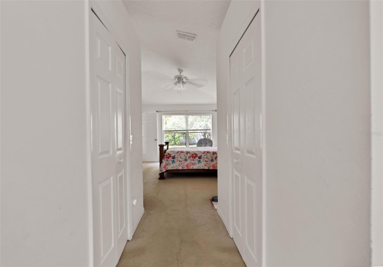 Hallway in primary bedroom from Bathroom - 7 PHOENIX LN, PALM COAST