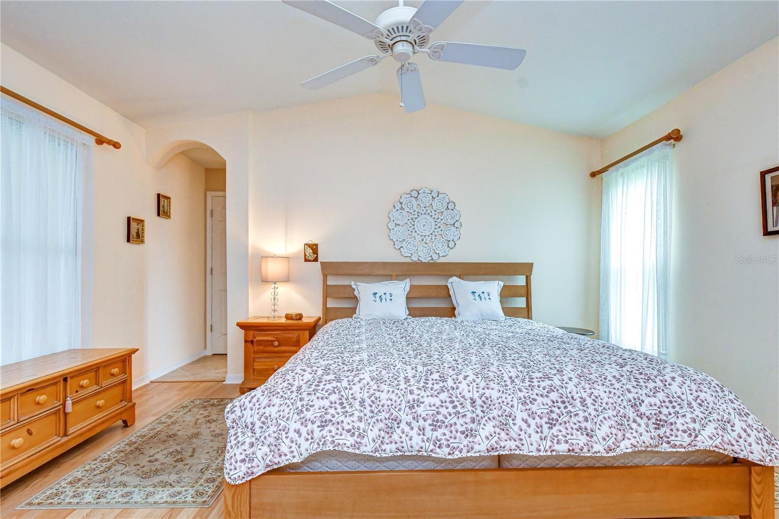 Spacious private retreat featuring a vaulted ceiling and beautiful wood flooring. - 5602 ROCKFIELD LOOP, VALRICO