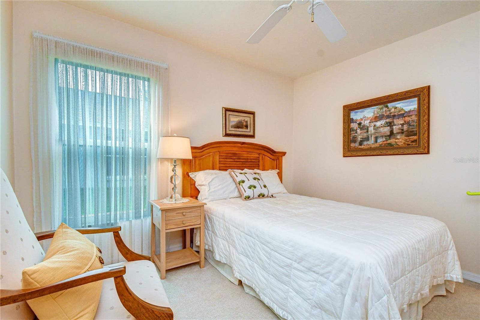 Comfortable secondary bedroom offering flexibility for family or guests. - 5602 ROCKFIELD LOOP, VALRICO