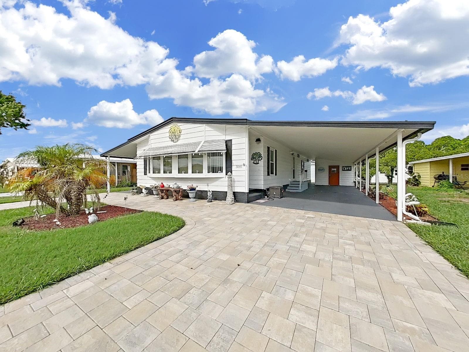 Manufactured Home at 5022 FOXWOOD BLVD, LAKELAND, photo 3 of 47