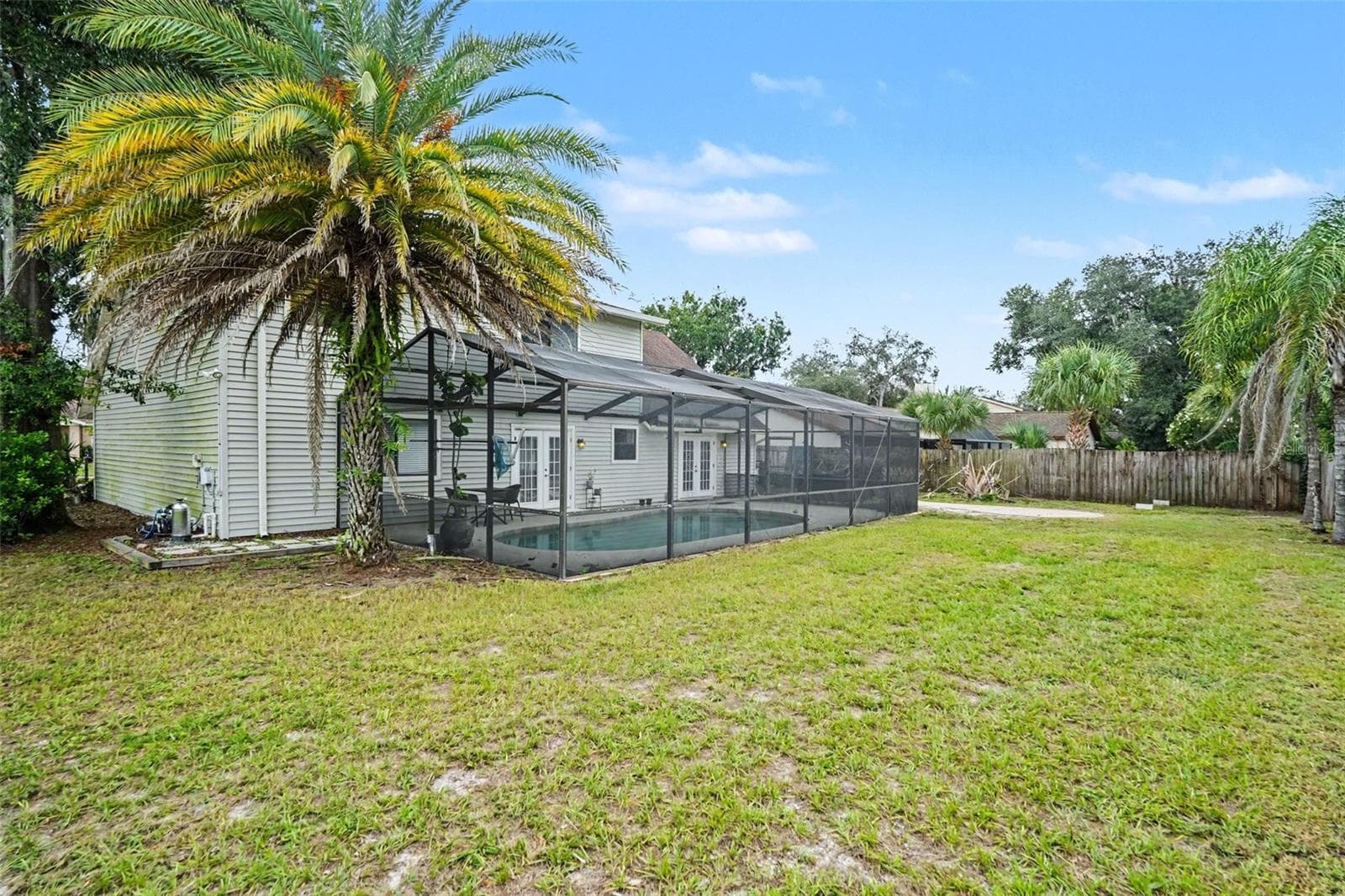 We have a great quote for PVC fence to complete the backyard oasis. - 736 SANDY CREEK DR, BRANDON