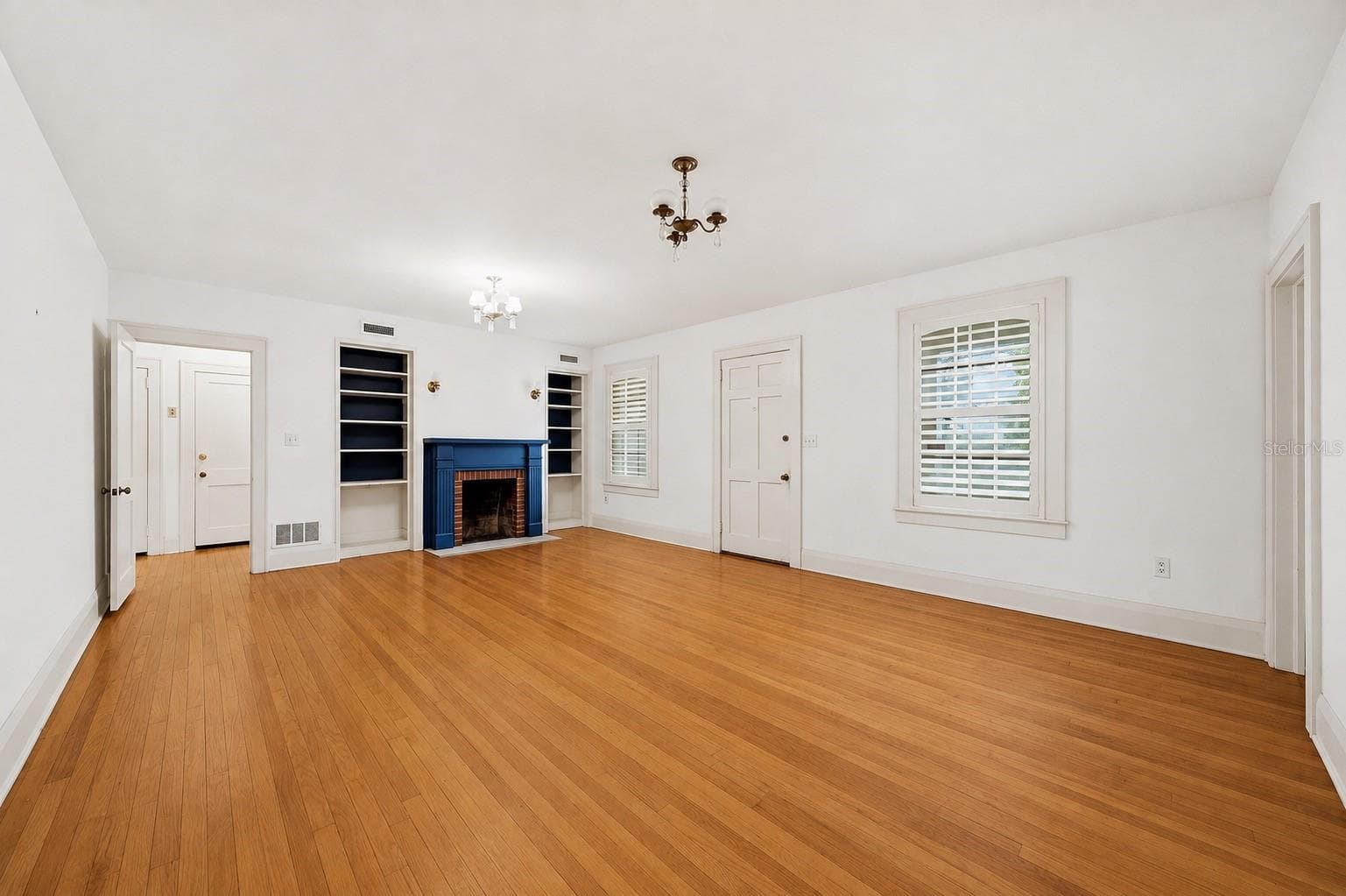Parlor Room leading to hallway with 4 bedrooms - 3123 W OAKLYN AVE, TAMPA