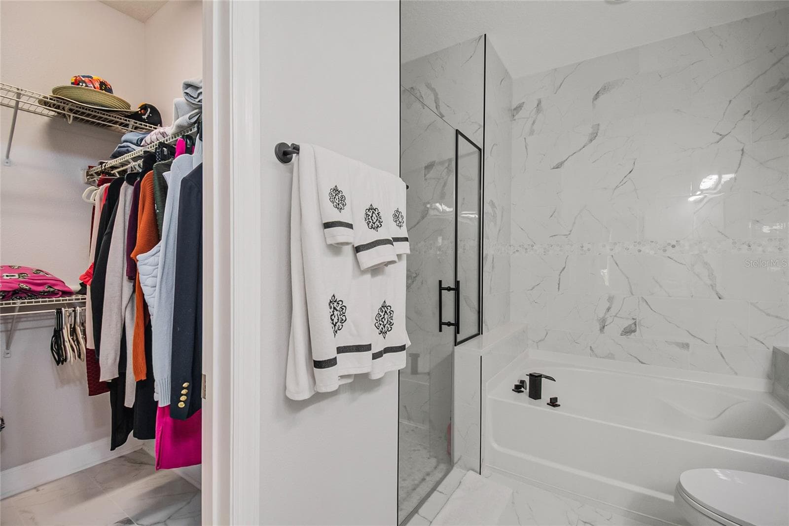 Primary walk-in closet - 2569 FOLIO WAY, KISSIMMEE