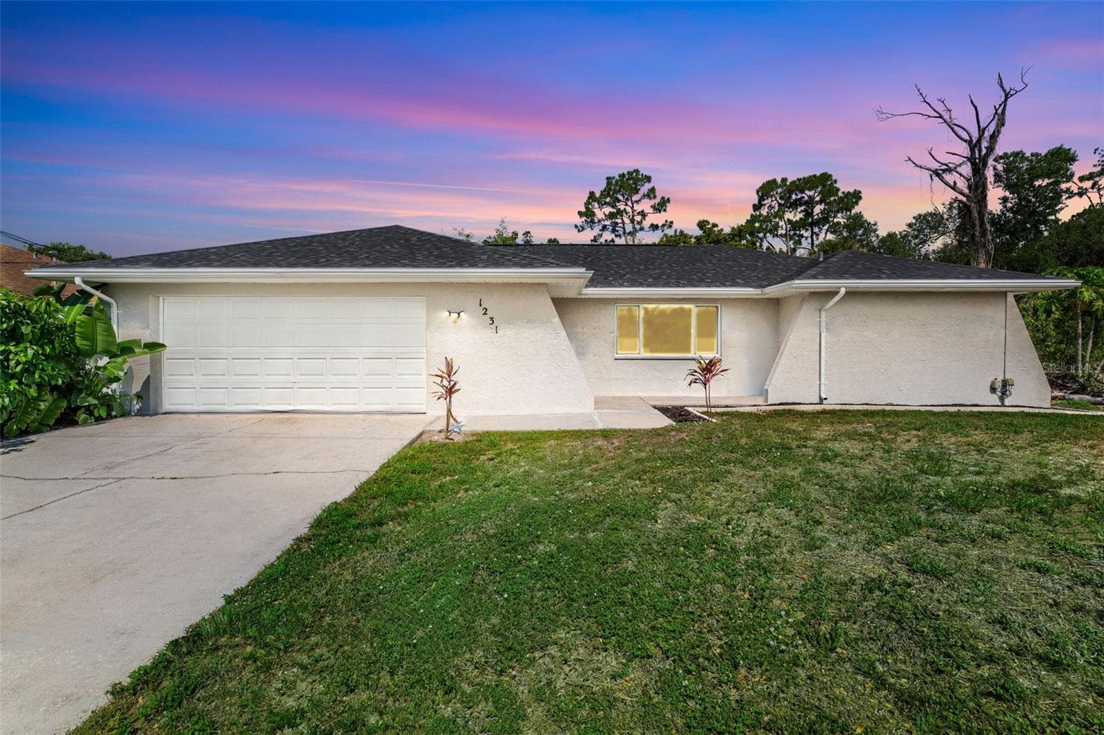 Front View Twilight - 1231 BEACON DR, PORT CHARLOTTE