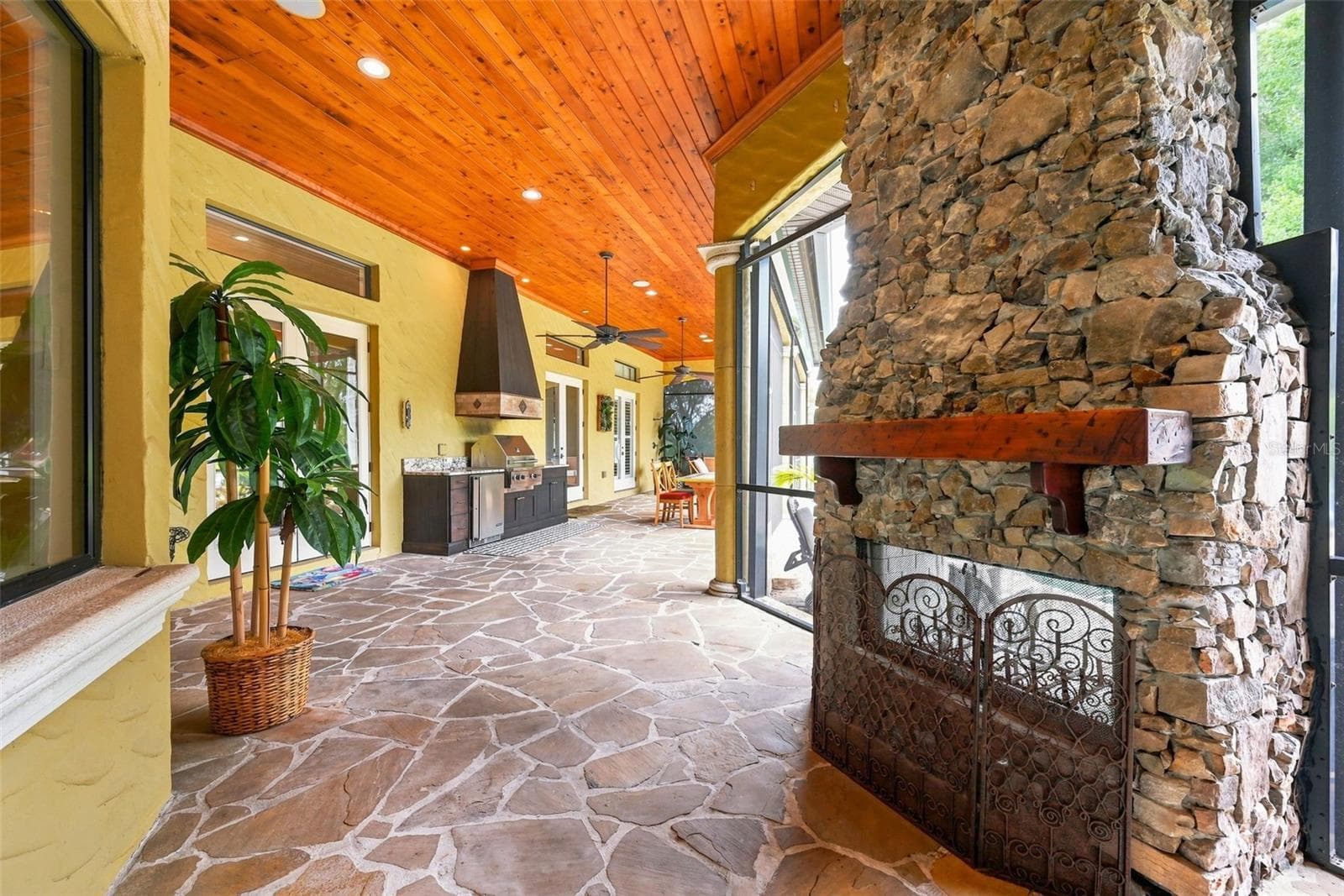 Screened In Lanai With Fireplace - 9679 WESTOVER ROBERTS RD, WINDERMERE