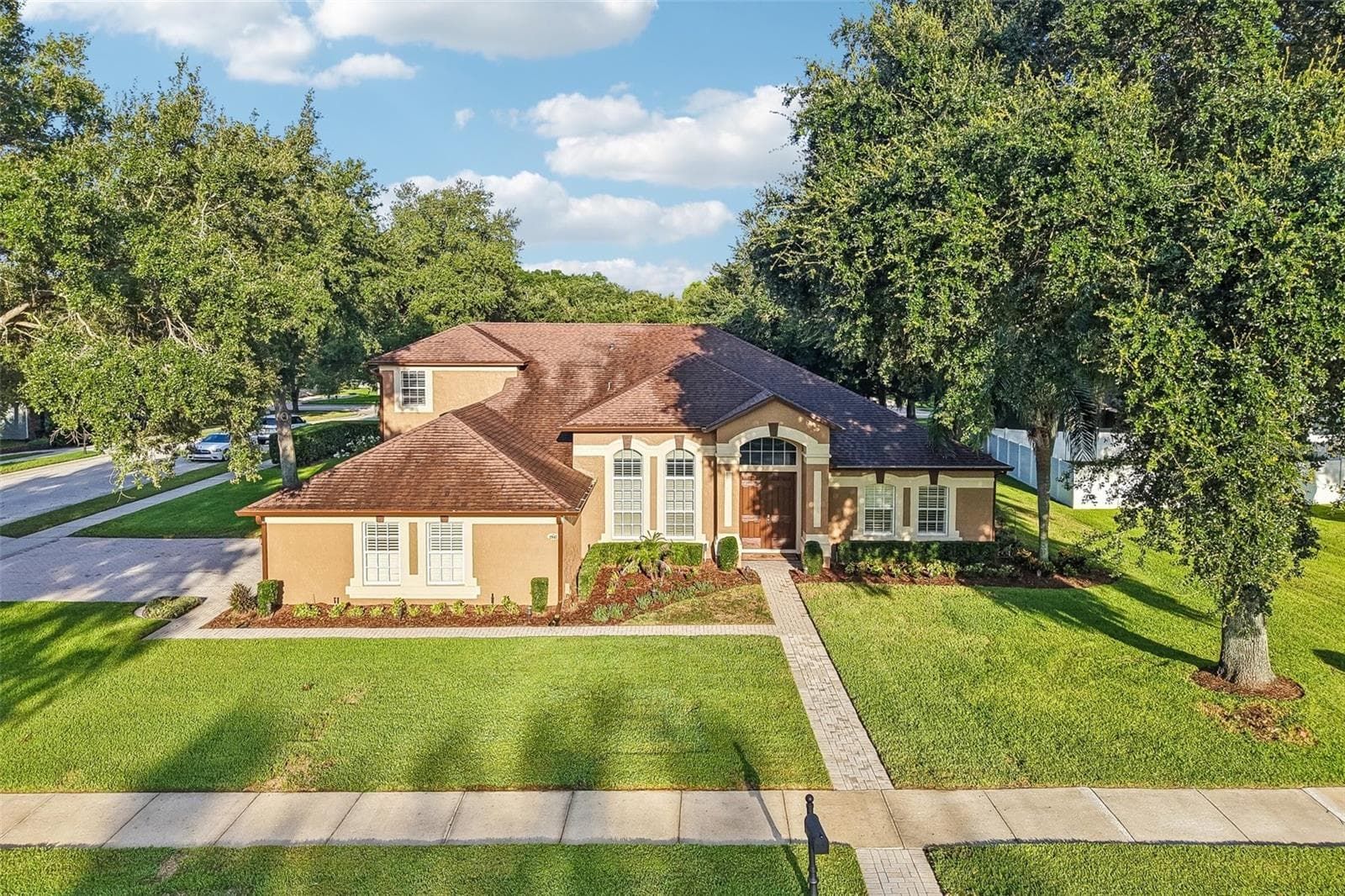 Welcome to one of Wekiva Run's most sought-after floor plans, offering exceptional space, flexibility, and timeless style on a beautifully landscaped .36 ACRE CORNER LOT! - 2947 CEDAR CREST DR, APOPKA