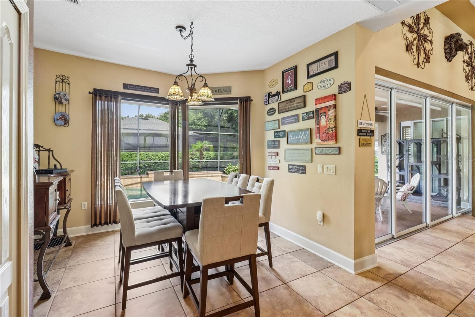 Charming breakfast nook overlooks the pool. - 2947 CEDAR CREST DR, APOPKA