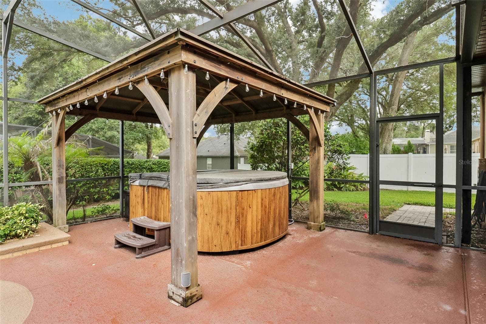 Above ground spa under a gazebo. - 2947 CEDAR CREST DR, APOPKA
