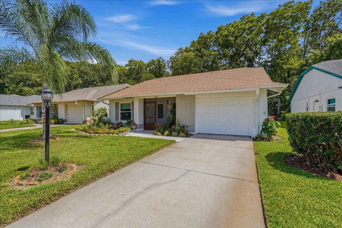 Single Family Residence at 11602 WHITE ASH DR, NEW PORT RICHEY, photo 2 of 58