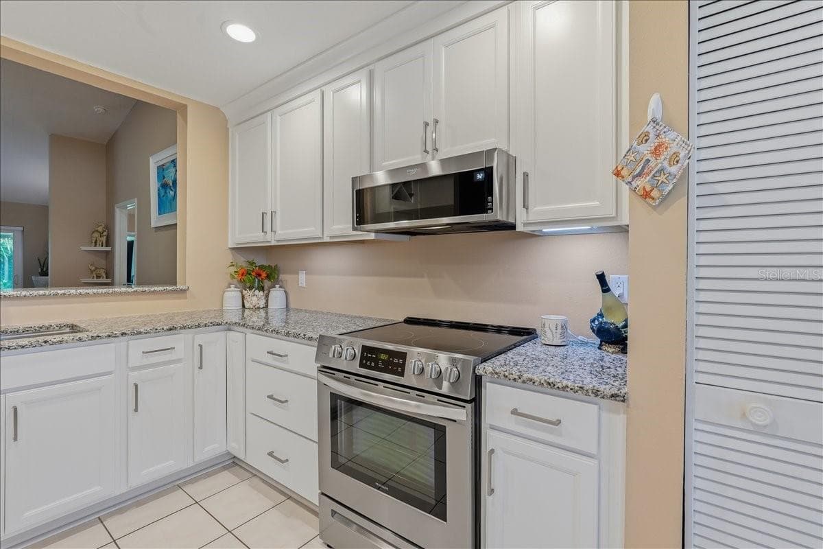 Single Family Residence at 11602 WHITE ASH DR, NEW PORT RICHEY, photo 13 of 58