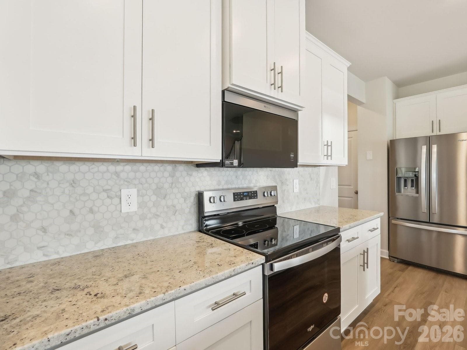 Photo is not of the actual home, but is an inspirational photo of builder’s model home and may depict options, furnishings, and/or decorator features that are not included - 2622 Celestial Drive, Newton