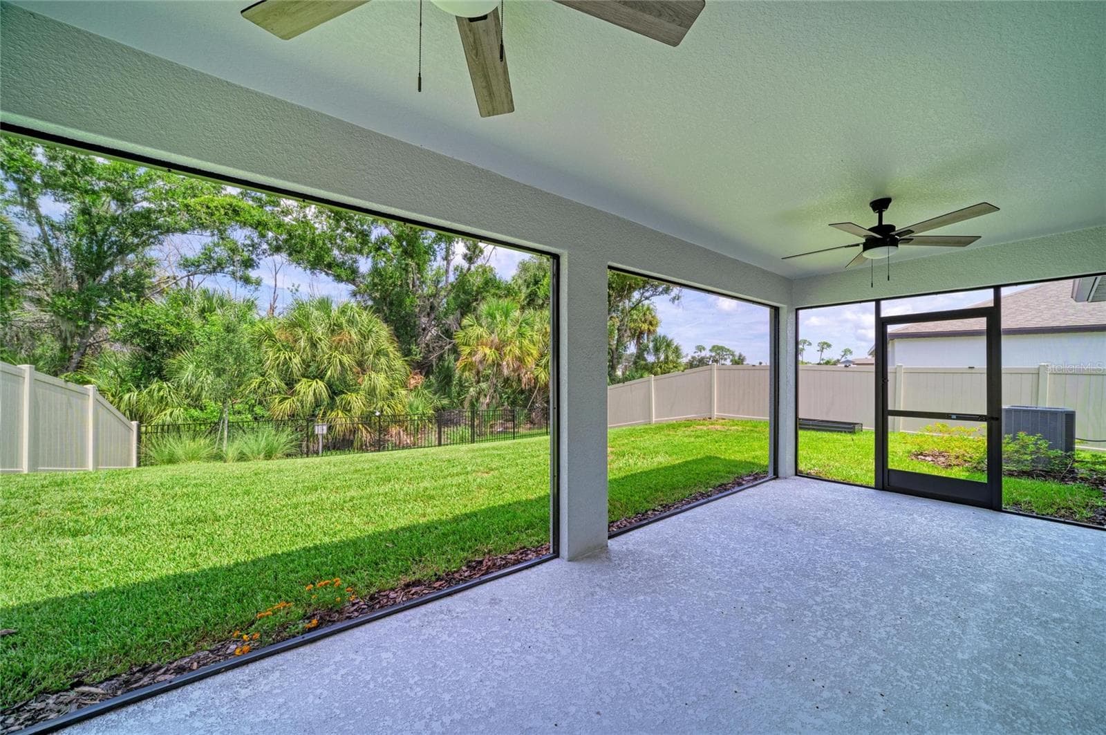 EXTRA-LARGE SCREENED LANAI with TWO CEILING FANS - 12703 BLUE REFLECTION AVE, PARRISH