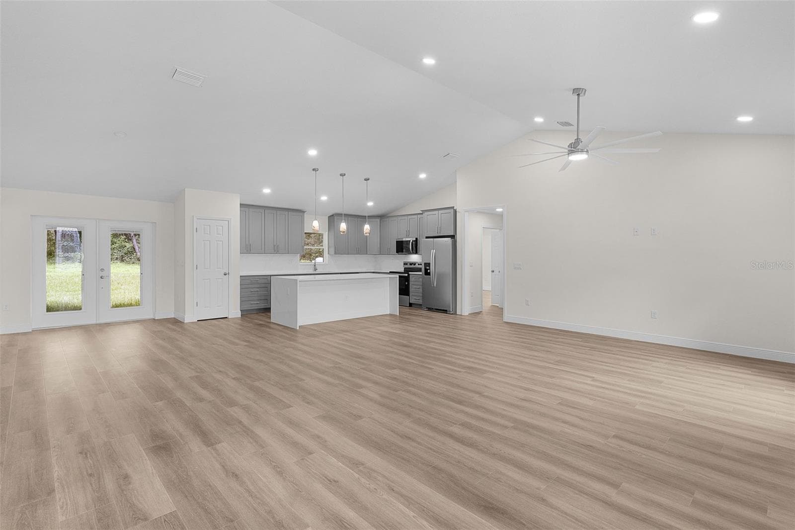 Step into your large living area with LVP Flooring. - 8277 SE 158TH ST, SUMMERFIELD