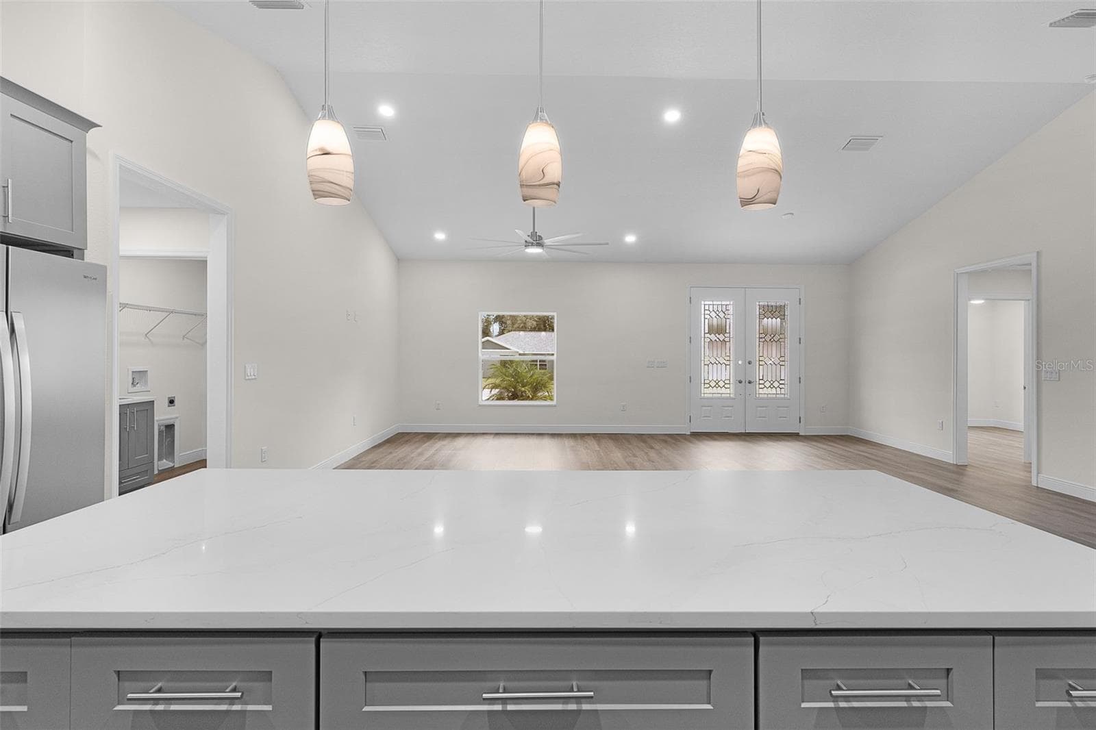 Beautiful Pendant lighting on your large kitchen island - 8277 SE 158TH ST, SUMMERFIELD