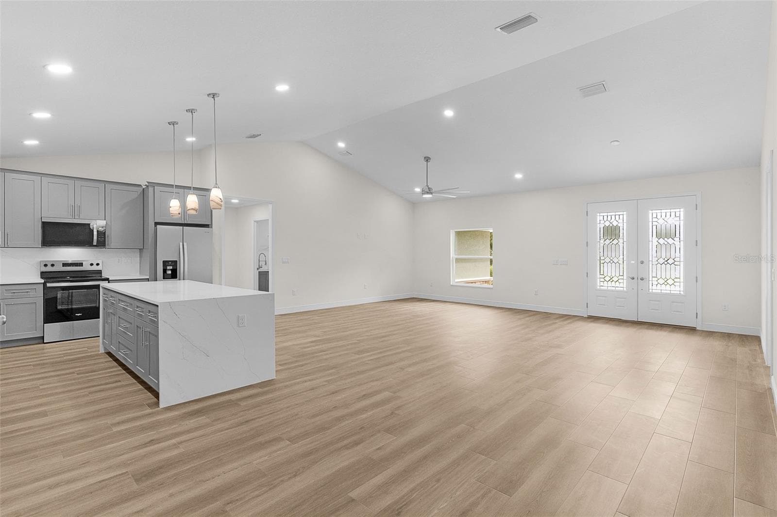 Open Floor Plan with lots of lights and clean look. - 8277 SE 158TH ST, SUMMERFIELD