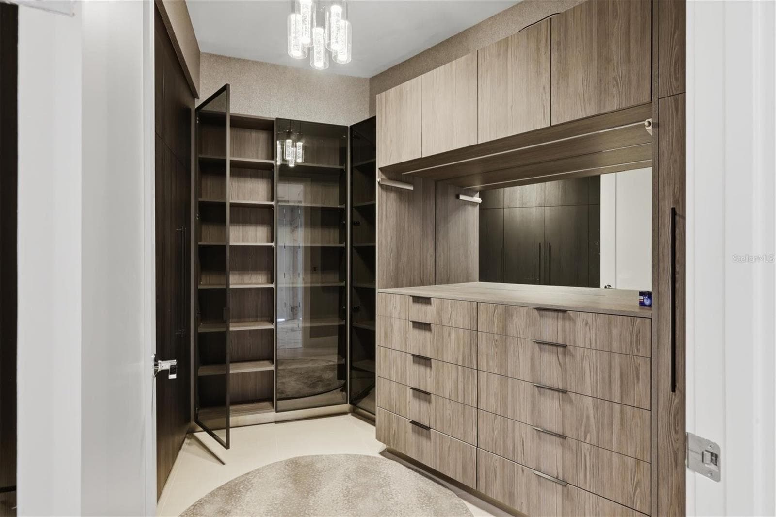 Custom-fitted closet has full-length mirror on door - 1155 N GULFSTREAM AVE #807, SARASOTA