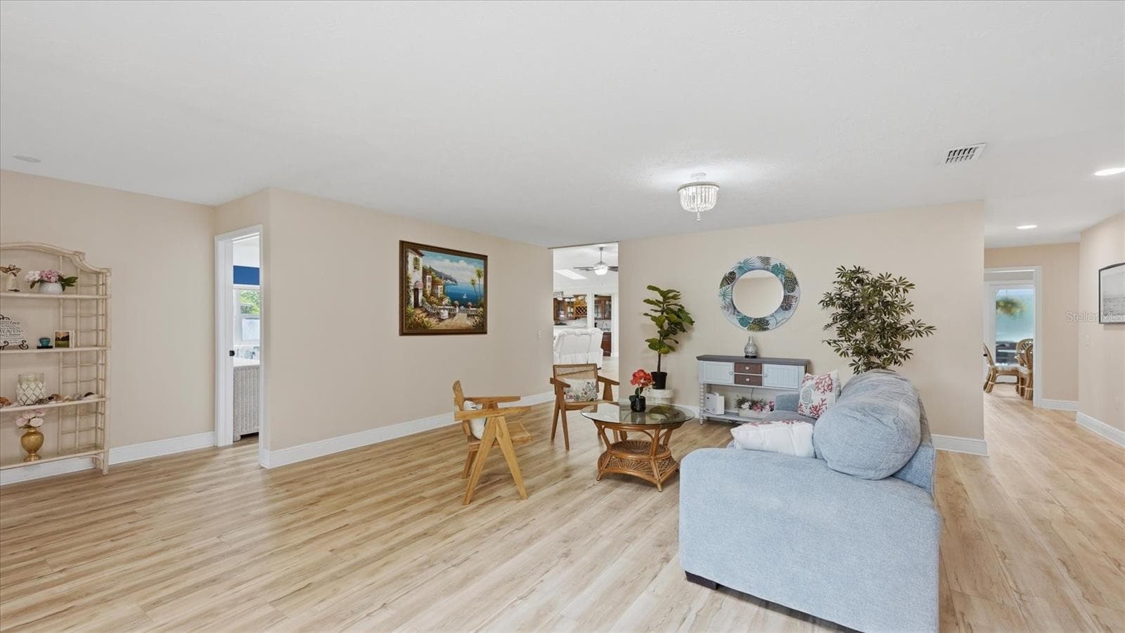 A spacious open foyer greets guests as they enter this beautiful home with brand new LVP flooring throughout - 15127 PENNINGTON RD, TAMPA