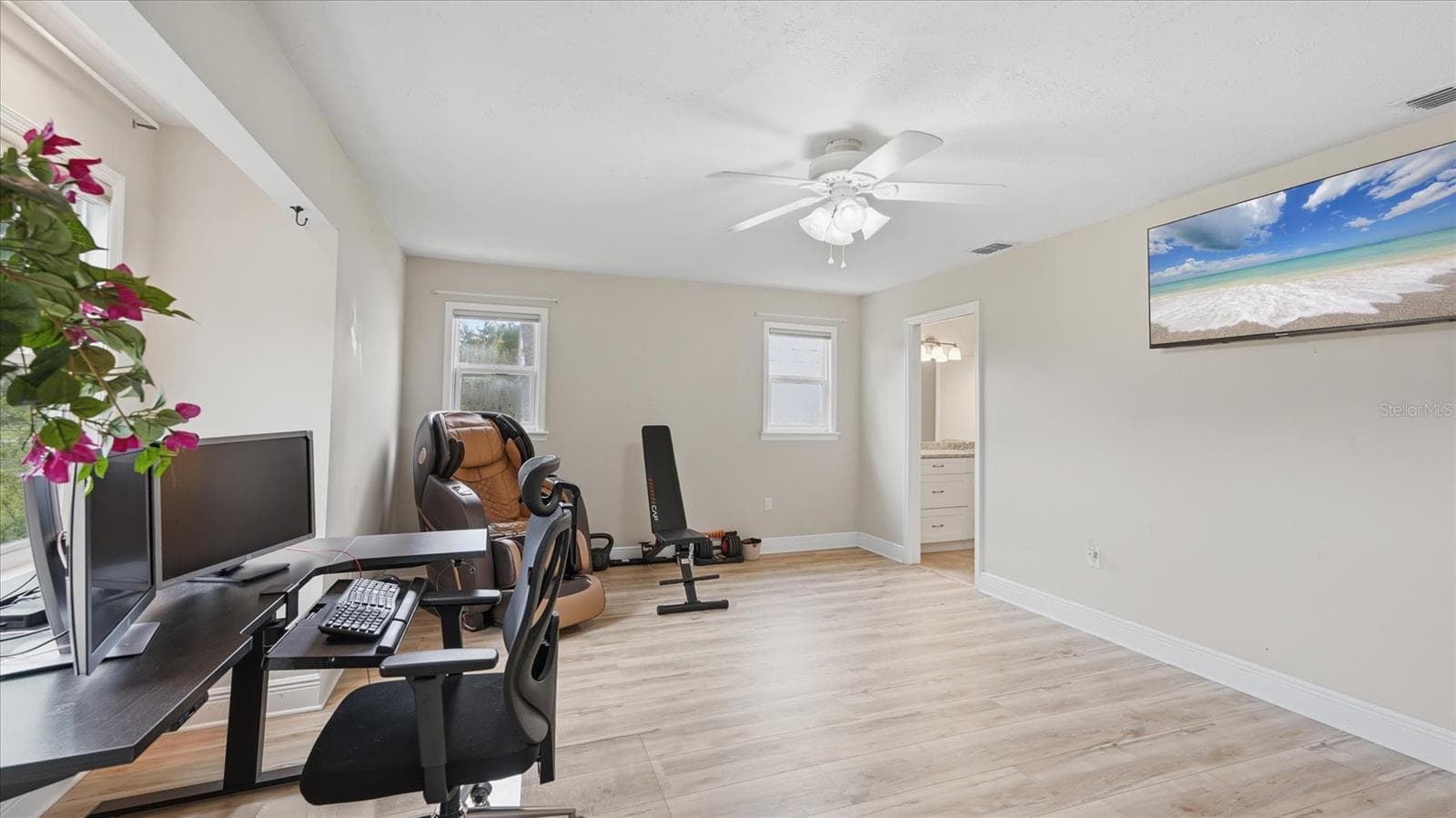 View into ensuite bath featuring a vanity for each bedroom - 15127 PENNINGTON RD, TAMPA