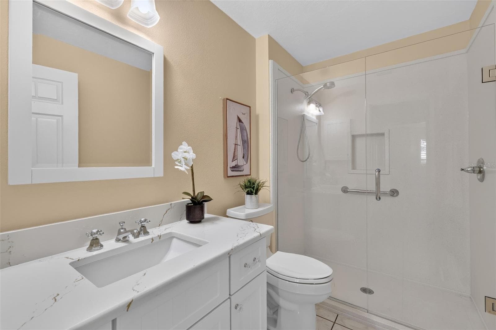 Guest bathroom with walk in shower and Quartz countertop - 1218 CAMERO DR, LADY LAKE