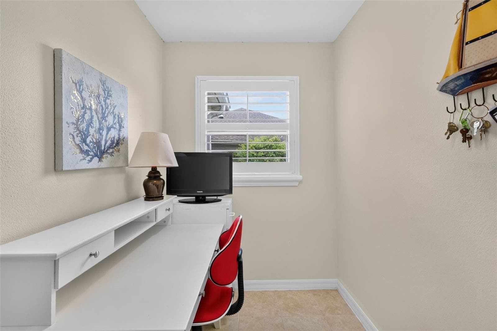 Desk area within the laundry room - 1218 CAMERO DR, LADY LAKE