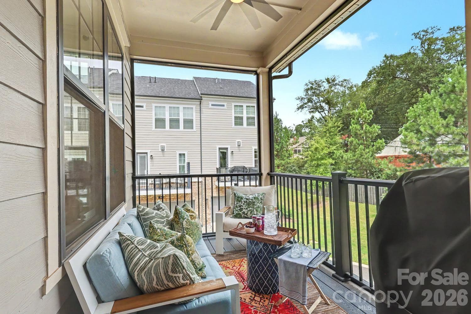 Spacious screened-in porch located directly off the kitchen, perfect for seamless indoor-outdoor living and entertaining. - 2505 Kenmore Avenue, Charlotte