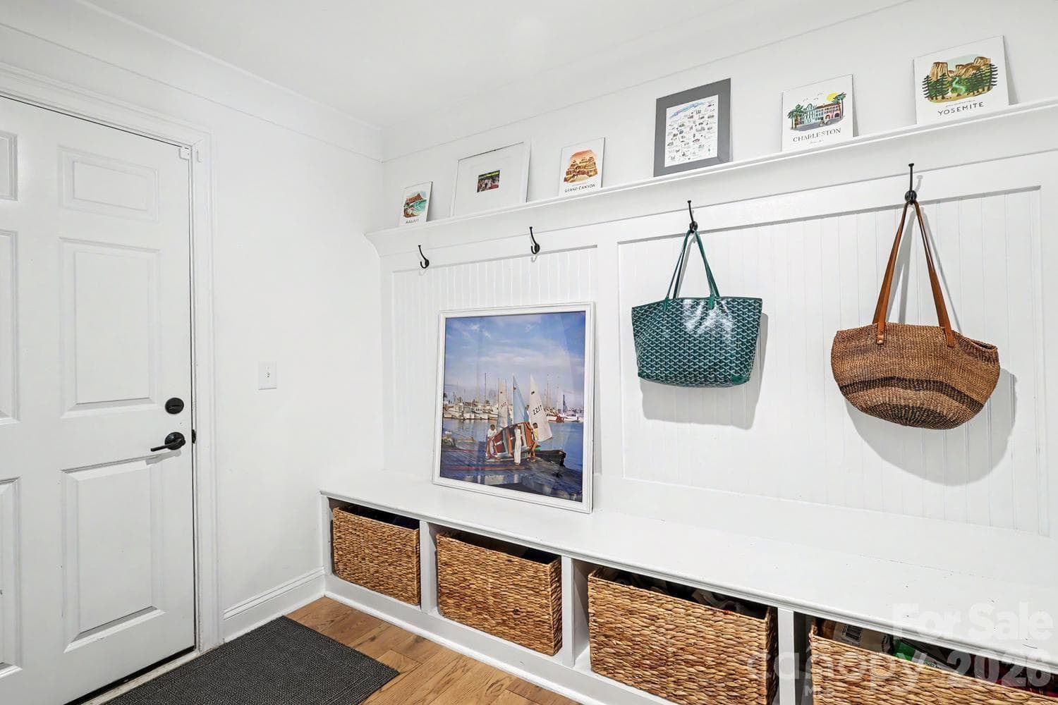 Convenient garage entry featuring dedicated storage space and immediate, direct access to the elevator. - 2505 Kenmore Avenue, Charlotte