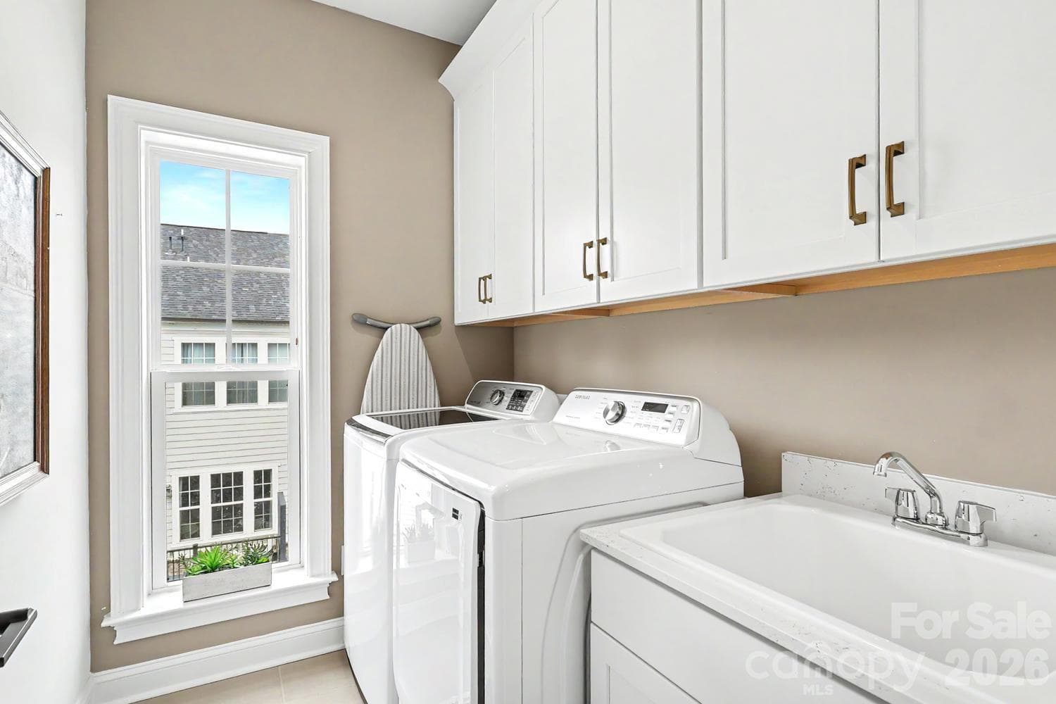 Laundry Room on the same floor with Primary Bedroom - 2505 Kenmore Avenue, Charlotte
